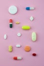 Group of capsules and pills in different colors and shape Royalty Free Stock Photo