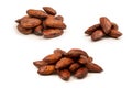 A group of caramelized almonds isolated on a white background Royalty Free Stock Photo
