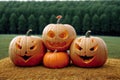 A Group Of Carved Pumpkins Sitting On Top Of A Pile Of Hay. Generative AI Royalty Free Stock Photo