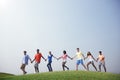 Group Casual People Walking Together Outdoors Concept