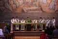 A group of Catholic priest and sisters in the Holy Mass