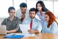 Group of caucasian and latin businespeople at work Royalty Free Stock Photo
