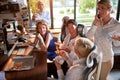 Group of cheerful business women are eating pizza and chatting at the break from work at workplace. Business, office, job Royalty Free Stock Photo