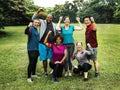 Group of cheerful diverse friends in the park Royalty Free Stock Photo