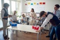A group of cheerful employees playing in the office. Employees, job, office Royalty Free Stock Photo