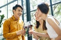 Three people toasting red wine at restaurant Royalty Free Stock Photo