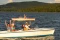 Group of friends racing with motorboats Royalty Free Stock Photo