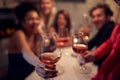 A group of cheerful friends toasting and posing for a photo of  New Year eve home party. Friendship, together, party, New Year Royalty Free Stock Photo