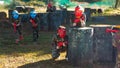 Group of cheerful kids playing paintball Royalty Free Stock Photo