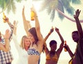 Group of Cheerful People Partying on a Beach Royalty Free Stock Photo