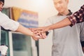 Group of cheerful students with holding hands in the campus, St Royalty Free Stock Photo