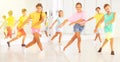 Cheerful tweens learning vigorous dance in choreography lesson