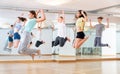 Group of cheerful tweens jumping during dances class