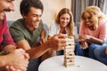 Friends playing jenga