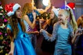 Group of cheerful young girls celebrating Christmas Royalty Free Stock Photo