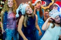 Group of cheerful young girls celebrating Christmas Royalty Free Stock Photo