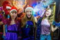 Group of cheerful young girls celebrating Christmas Royalty Free Stock Photo