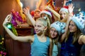 Group of cheerful young girls celebrating Christmas. Selfie Royalty Free Stock Photo