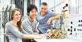 Group of cheerful young students in vocational education and training for electronics Royalty Free Stock Photo