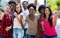 Group of cheering african american and caucasian and hispanic and latin young adults