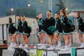 Cheerleaders at high school football game Royalty Free Stock Photo