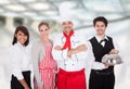 Group of chef and waiters Royalty Free Stock Photo