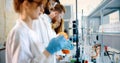 Group of chemistry students working in laboratory Royalty Free Stock Photo