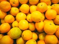 Group of chewy oranges in the supermarket, Background orange, Fresh oranges from the farm garden, lots of orange in the market Royalty Free Stock Photo