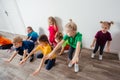 Group of children doing gymnastics in kindergarten or daycare Royalty Free Stock Photo