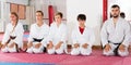 Kids taekwondo group ready to practice