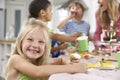 Group Of Children Enjoying Birthday Party Food At Table Royalty Free Stock Photo