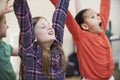 Group Of Children Enjoying Drama Class Together Royalty Free Stock Photo