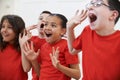 Group Of Children Enjoying Drama Class Together Royalty Free Stock Photo