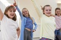 Group Of Children Enjoying Drama Class Together Royalty Free Stock Photo