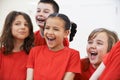 Group Of Children Enjoying Drama Class Together