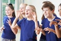 Group Of Children Enjoying Drama Class Together