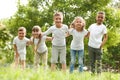 Group of children huddling. Volunteer project