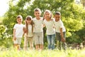 Group of children huddling. Volunteer project