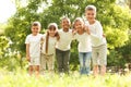 Group of children huddling in park