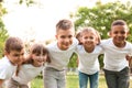 Group of children huddling. Volunteer project