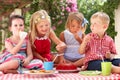 Group Of Children At Outdoor Tea Party Royalty Free Stock Photo