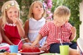 Group Of Children At Outdoor Tea Party Royalty Free Stock Photo
