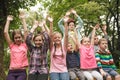 Group of children on a park bench Royalty Free Stock Photo