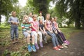 Group of children on a park bench Royalty Free Stock Photo