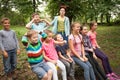 Group of children on a park bench Royalty Free Stock Photo