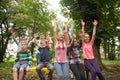 Group of children on a park bench Royalty Free Stock Photo