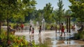 A group of children are playing in a fountain in a park AIG41 Royalty Free Stock Photo