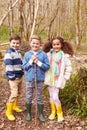 Group Of Children Playing Game In Forest Royalty Free Stock Photo