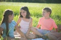 Group of children playing on grass Royalty Free Stock Photo