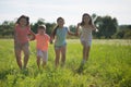 Group of children playing on grass Royalty Free Stock Photo